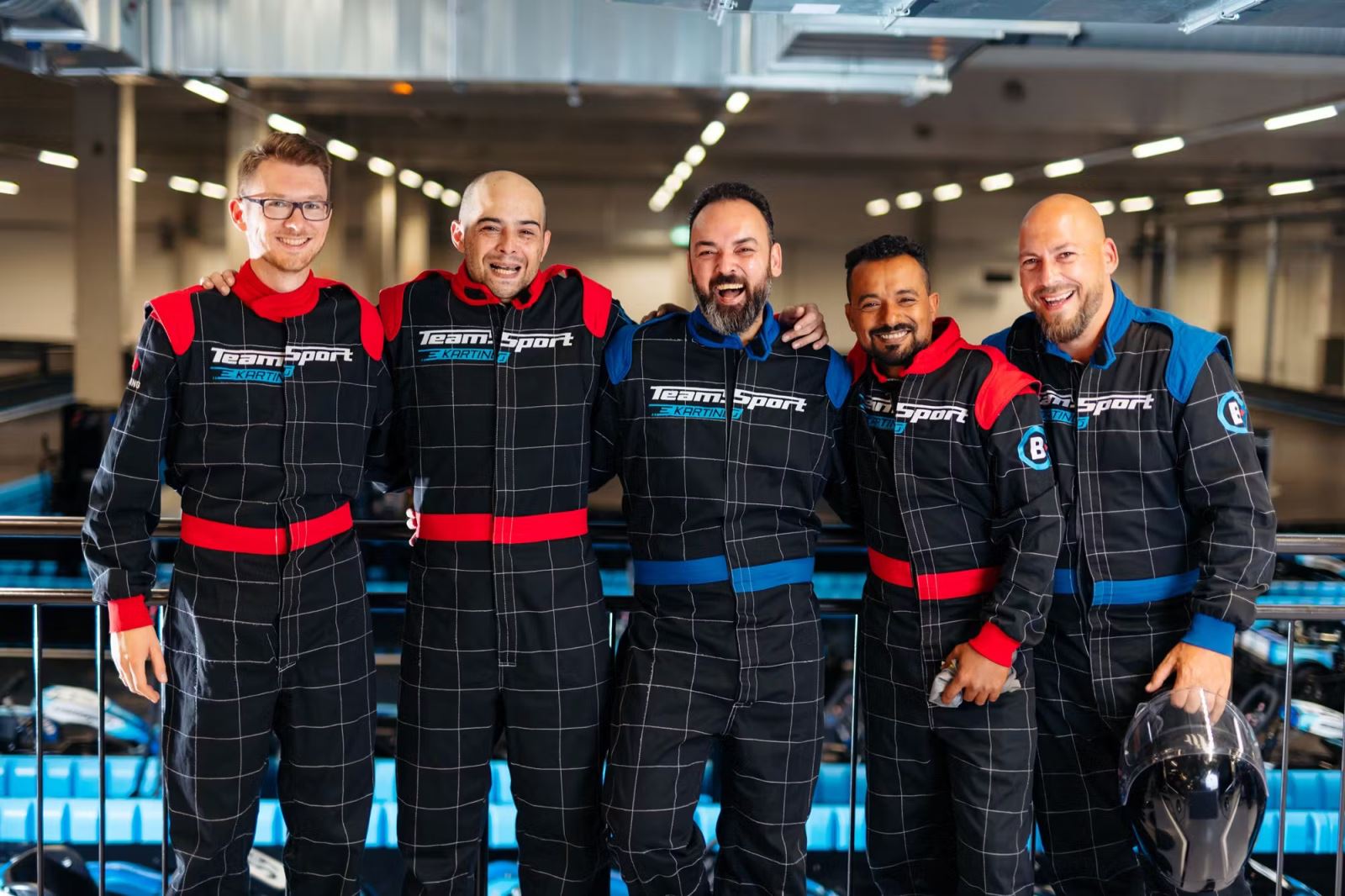 Men dressed for go karting